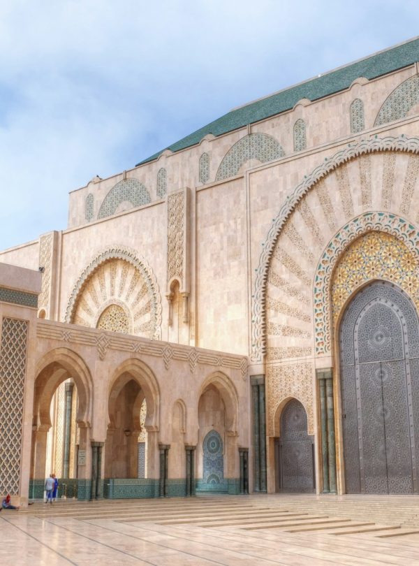 beige concrete building under blue sky during daytime
